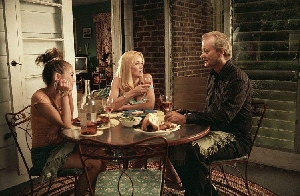 Alexis Dziena and Sharon Stone, hoping that if they stare long enough, Bill Murray will say something.