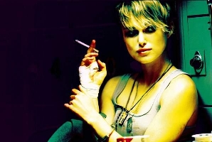 Keira Knightley doing the old tape-the-fag-to-the-finger trick.