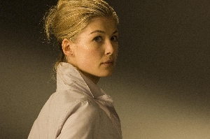 Rosamund Pike wonders if a deformed alien would leave the toilet seat up.