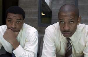 Chiwetel Ejiofor and Denzel Washington feel they should watch the brothel's CCTV video just one more time.